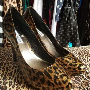 Gold and black leopard pumps